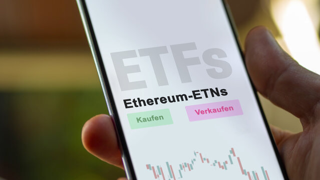 December 2022. An investor analyzes the Ethereum-ETNs ETF fund on phone screen Ethereum-ETNs. German text translated :Kaufen, Verkaufen, Ethereum-ETNs= buy, Sell, Ethereum ETNs