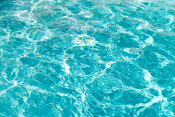 turquoise color background of swimming pool water with ripples in miami