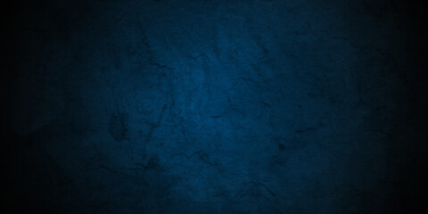 Dark black and blue stone concrete grunge wall texture and backdrop background anthracite panorama. Panorama dark black or blue slate background or texture.	