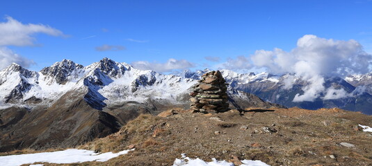 a stone pyramid on the top of the alps in tirol