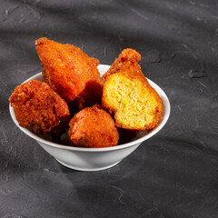 Fried tender corn croquettes - Colombian traditional food