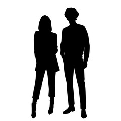 Vector silhouettes of  man and a woman, a couple standing   business people, black  color isolated on white background