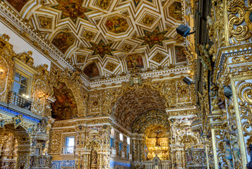 Obraz premium Interior of a historic gold-leafed baroque church in Pelourinho in the city of Salvador, Bahia