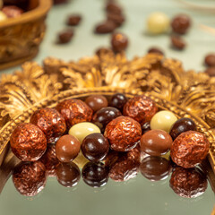 Dragee, confetto or sugared almond on the mirror