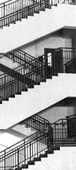 Concept black and white shot of an staircase. Urban