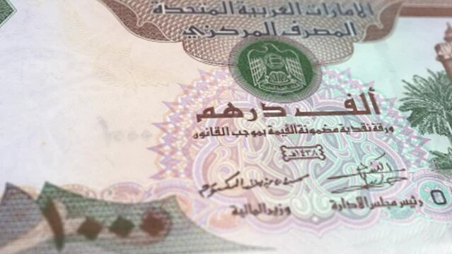 United Arab Emirates dirham 1000 Banknotes, One Thousand United Arab Emirates dirham, Close-up and macro view of the Arab Emirates dirham, Tracking and Dolly Shots 1000 UAE Dirham banknote Observe