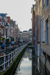 A canal and houses in the city center of Delft, Netherlands 