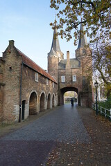 Fototapeta na wymiar Oospoort Delft building, with a turistic view 