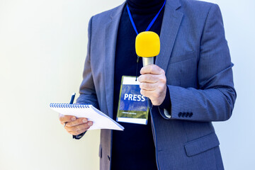 Reporter wearing journalist pass at news event, press conference or journalistic media interview...