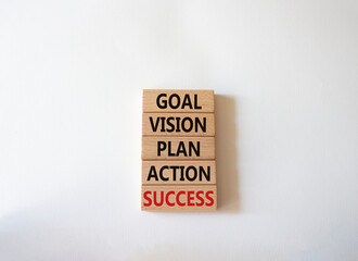 Goal Vision Plan Action Success symbol. Concept words Goal Vision Plan Action Success on wooden blocks. Beautiful white background. Business and Goal Vision Plan Action Success concept. Copy space.