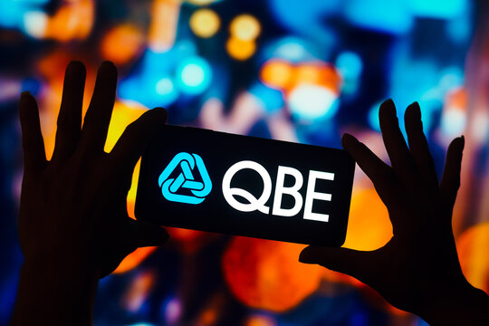 December 24, 2022, Brazil. In this photo illustration, the QBE Insurance Group logo is displayed on a smartphone mobile screen..