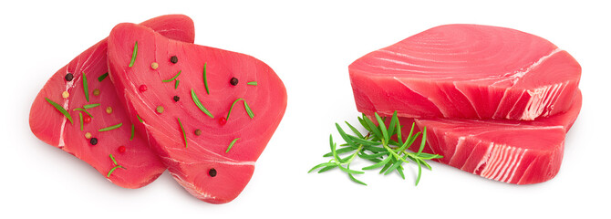Fresh tuna fish fillet steak with rosemary, lemon and peppercorns isolated on white background . Top view. Flat lay