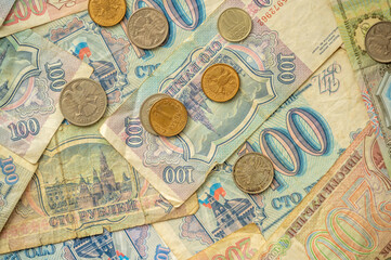 Background image of old rubles from the Yelstin period following the collapse fo the Soviet Union.