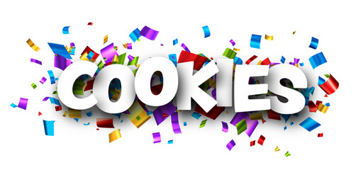 Cookies sign over cut out foil ribbon confetti background...