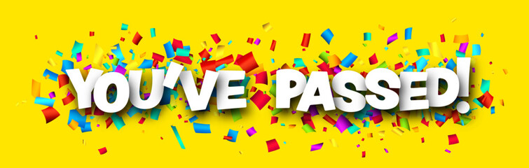 You've passed sign over cut out ribbon confetti background.