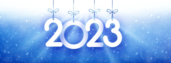 Banner with hanging 2023 sign on blue snowing background.