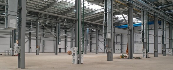 Newly built empty production hall of a medical enterprise before the installation of production...