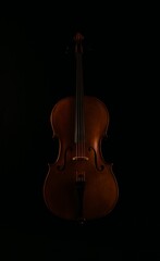 Cello on black background