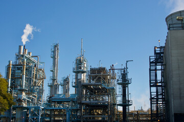 Fototapeta na wymiar complex pipes and tubes of an oil refinery plant