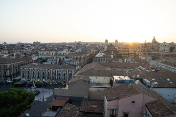 Obraz premium View over Catania from the dome of the Abbey of St Agatha at sunset, Sicily, Italy