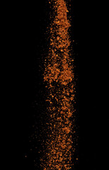 Red Hot Chilli flying explosion, red grain chilli explode abstract cloud fly. Beautiful complete seed chilly splash in air, food object design. Selective focus freeze shot black background isolated