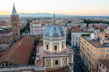 Fototapeta na wymiar Aerial view of the Cupola on the Basilica Papale di Santa Maria Maggiore at Sunrise