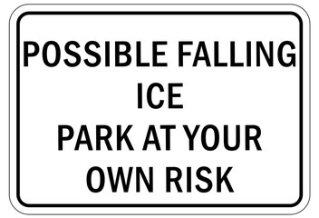 Fototapeta na wymiar Ice warning sign and labels possible falling ice park at own risk