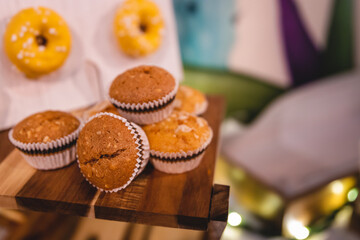 muffins with chocolate and nuts on a plate