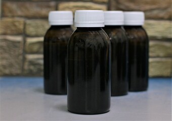 bottle with syrup for children from temperature