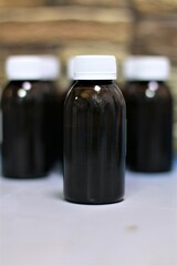 bottle with syrup for children from temperature