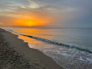 Beautiful view of sandy beach at sunrise