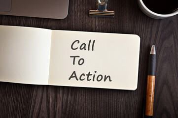 There is notebook with the word Call To Action. It is an eye-catching image.