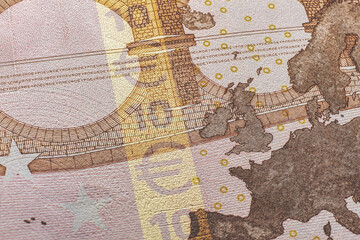 closeup of a European currency seal, with a hologram and various other security features visible....