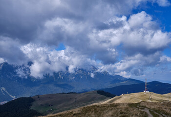 Mountain landscape.
Beautiful sunny day in the mountains.
Low clouds in mountains
Carpathian mountains in Romania