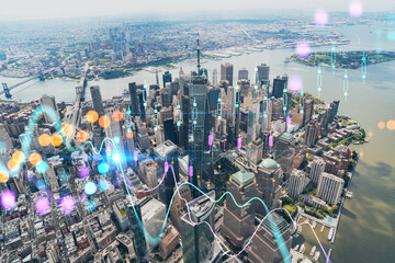 Aerial panoramic helicopter city view, Lower Manhattan, Downtown, New York, USA. World Trade Center, bridges. Forex candlestick graph hologram. The concept of internet trading, brokerage, analysis