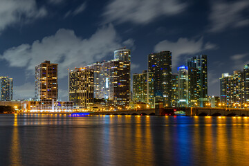 Fototapeta na wymiar View of The Downtown Miami Lights Reflecting on Biscayne Bay, Miami, Florida, USA