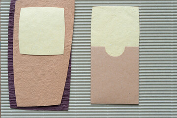 paper shapes and envelope on corrugated paper