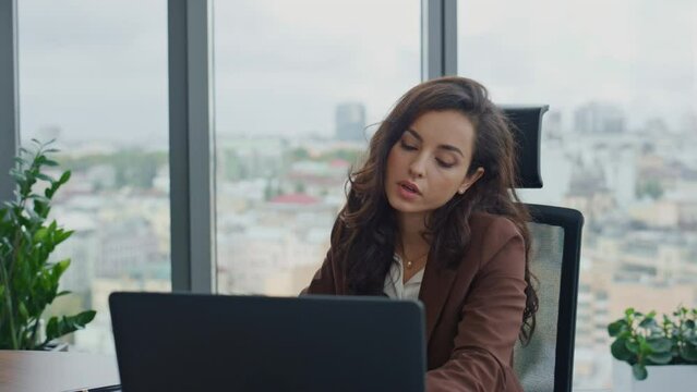 Manager tired work routine sitting office with laptop feeling unfocused closeup.