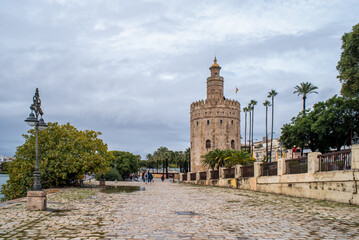 Fototapeta na wymiar Golden tower Torre del Oro in Seville, Andalusia, Spain