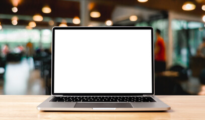 Laptop blank screen on wood table with coffee cafe background, mockup, template for your text,...