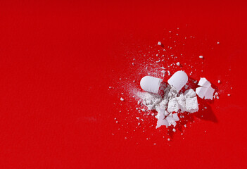 Drugs, pills are cut and scattered on the floor