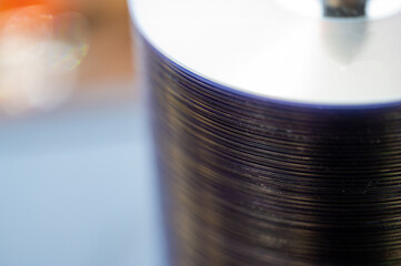 Selective focus on a sleeve of compact discs CD's used for storing electronic media.
