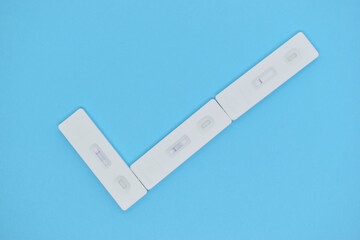 covid test kit on blue background