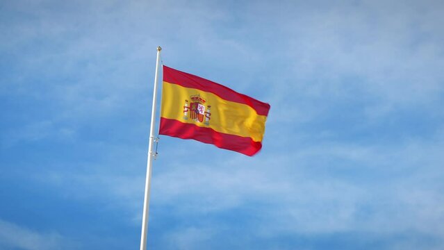 Spanish flag moved by wind, closeup.National flag of Spain waving in strong wind