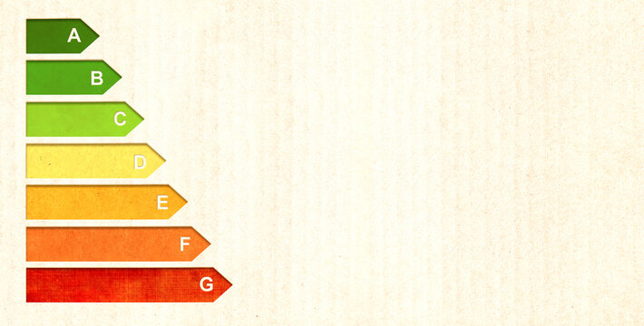 Energy efficiency chart on cardboard texture. Horizontal banner with eco paper texture. Paper cardboard background. Energy class, bio energetic, ecology and zero waste concept