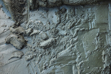 Liquid cement solution. View from top. Close-up building material. Blank surface Abstract...