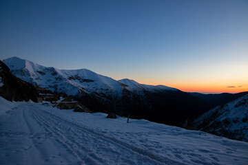 Fagaras mountains covered with snow in golden hour