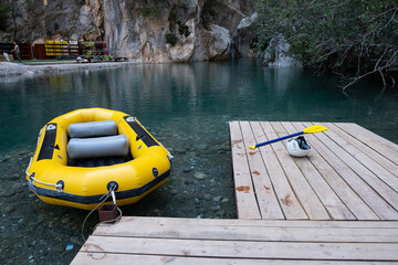 yellow gray inflatable rafting boat