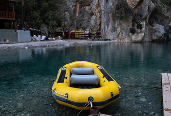 yellow gray inflatable rafting boat