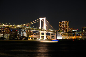 A beautiful suspension bridge at night in Tokyo, Dec 2022